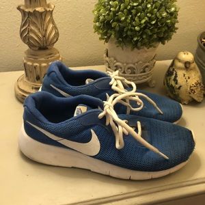 Boys Nike tennis shoes- 7 youth blue and white